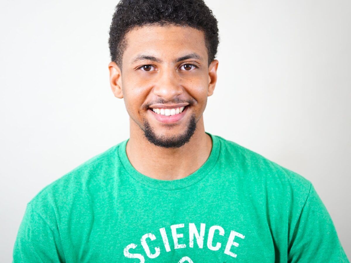 photography of a guy wearing green shirt